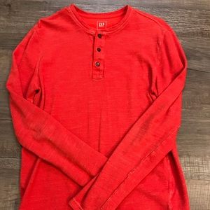 Bright red long sleeve shirt